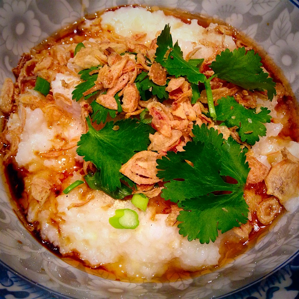 Dinner for sick Malaysian woman: Homemade fish congee. Mum would make this for us whenever we got...