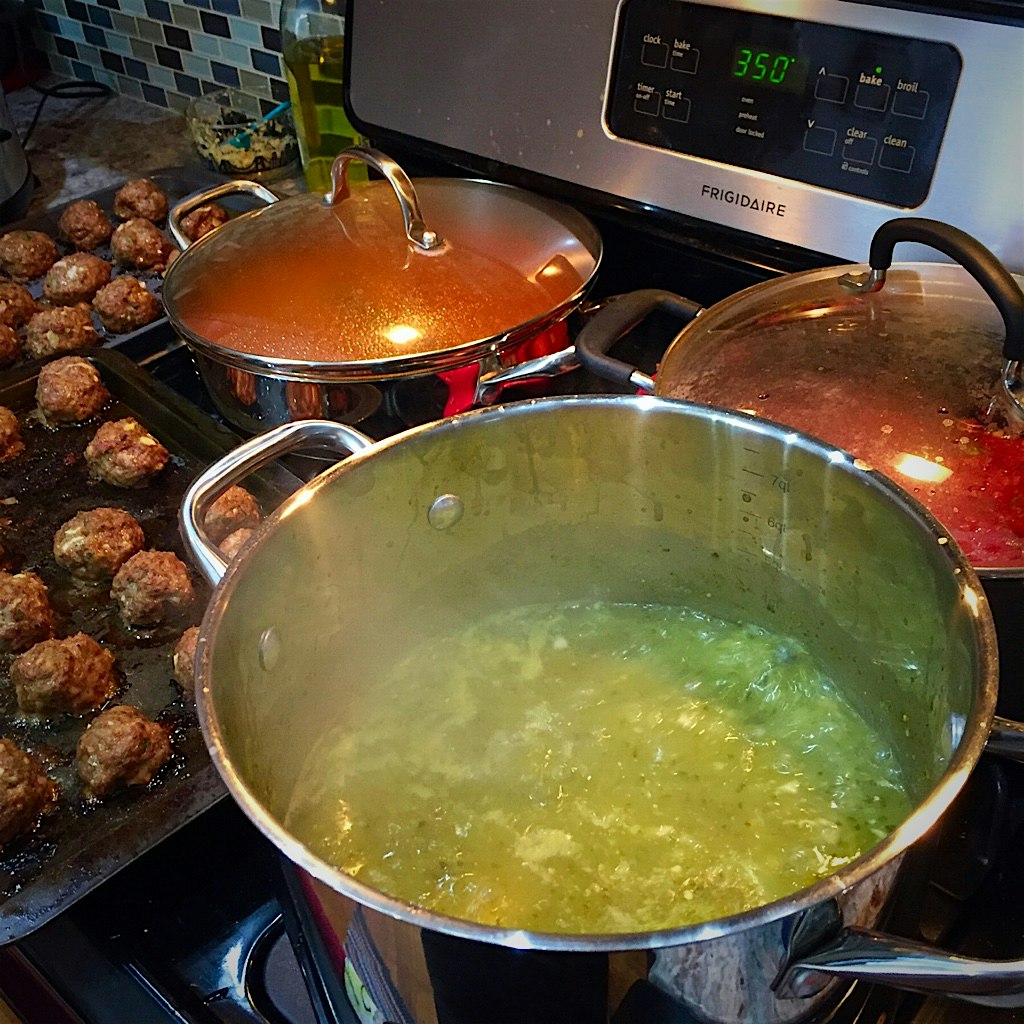 Magic in the making: homemade sauces simmering for enchiladas, tacos al pastor, and marinara sauc...