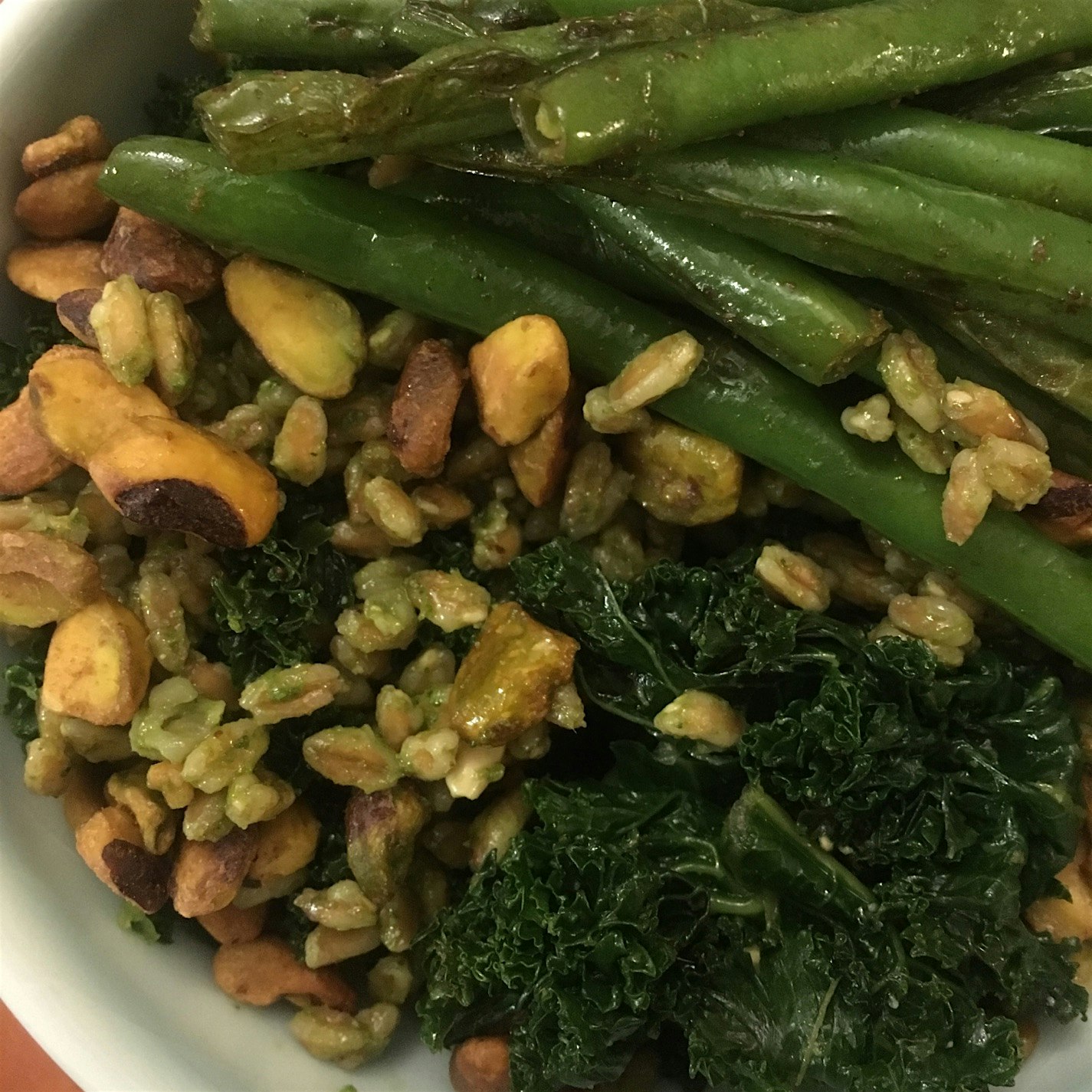 Combined some sautéed CSA Kale and Green beans with leftover farro and pesto to make this greener...