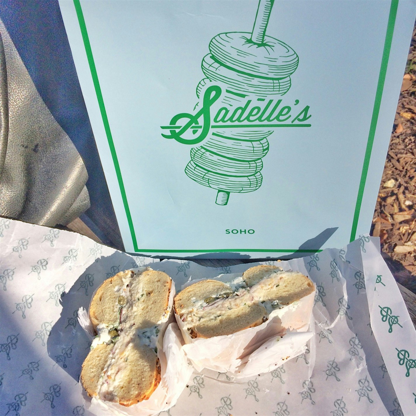 Took my Sadelle's breakfast to go and munched in the park... Chewy everything bagel with Whitefis...