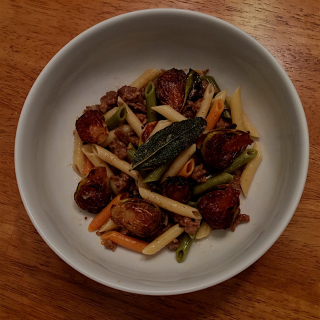 The perfect Tuesday pick-me-up: Spicy roasted brussels, Italian sausage, sage brown butter and pe...