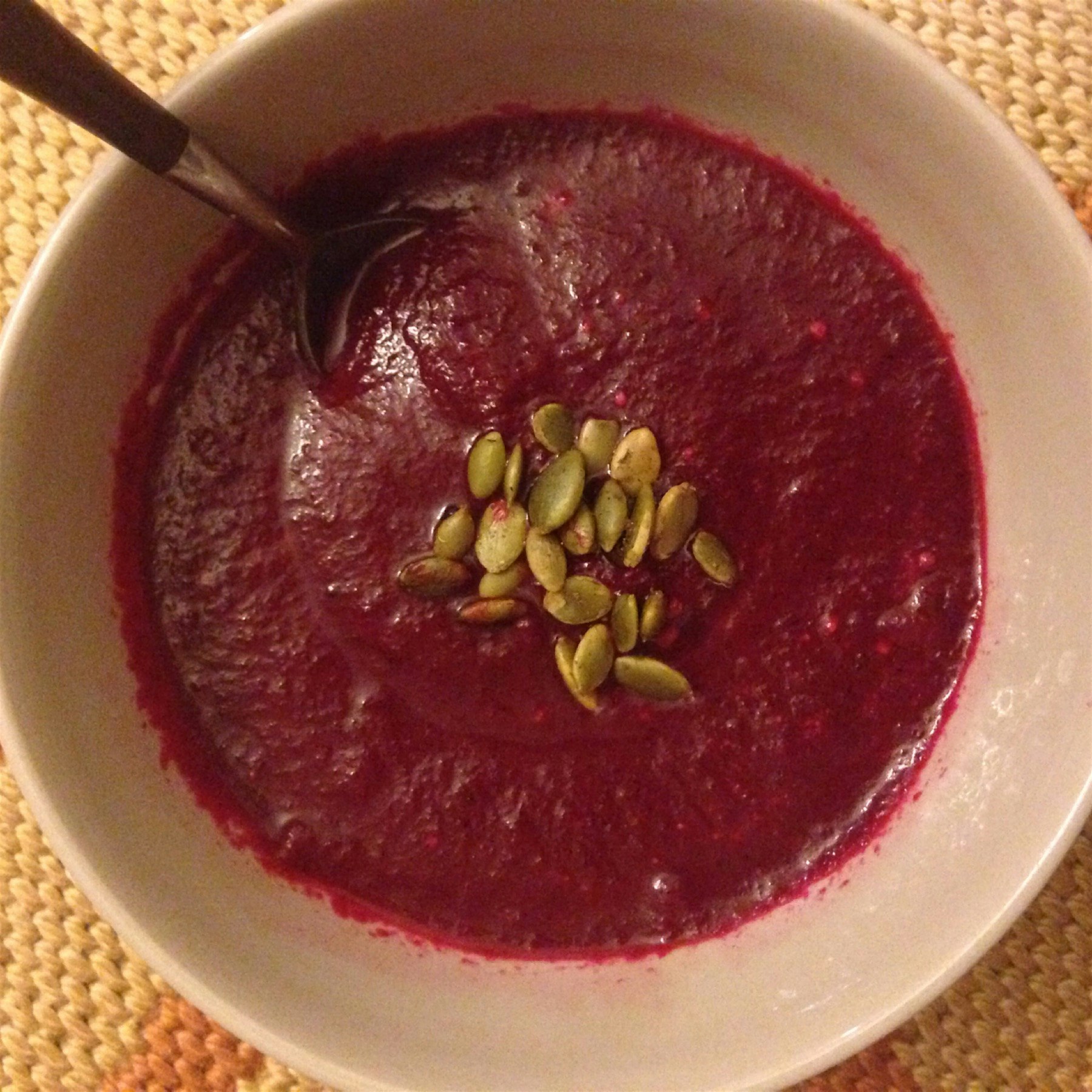 Beet and caramelized onion soup topped with roasted pumpkin seeds. Delish 👍 