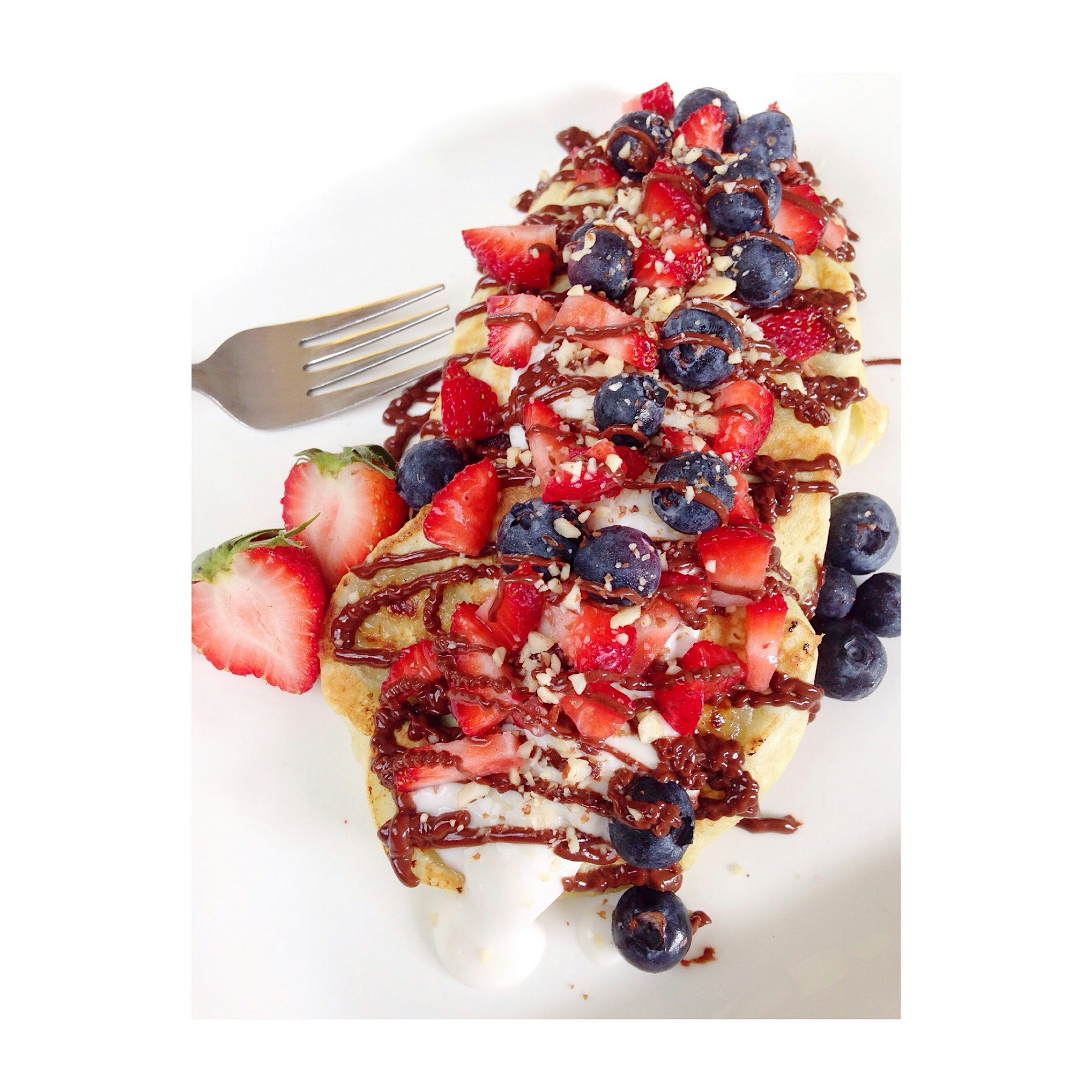 Breakfast is served! Mini chocolate chip & banana pancakes, fresh haupia sauce, chocolate drizzle...