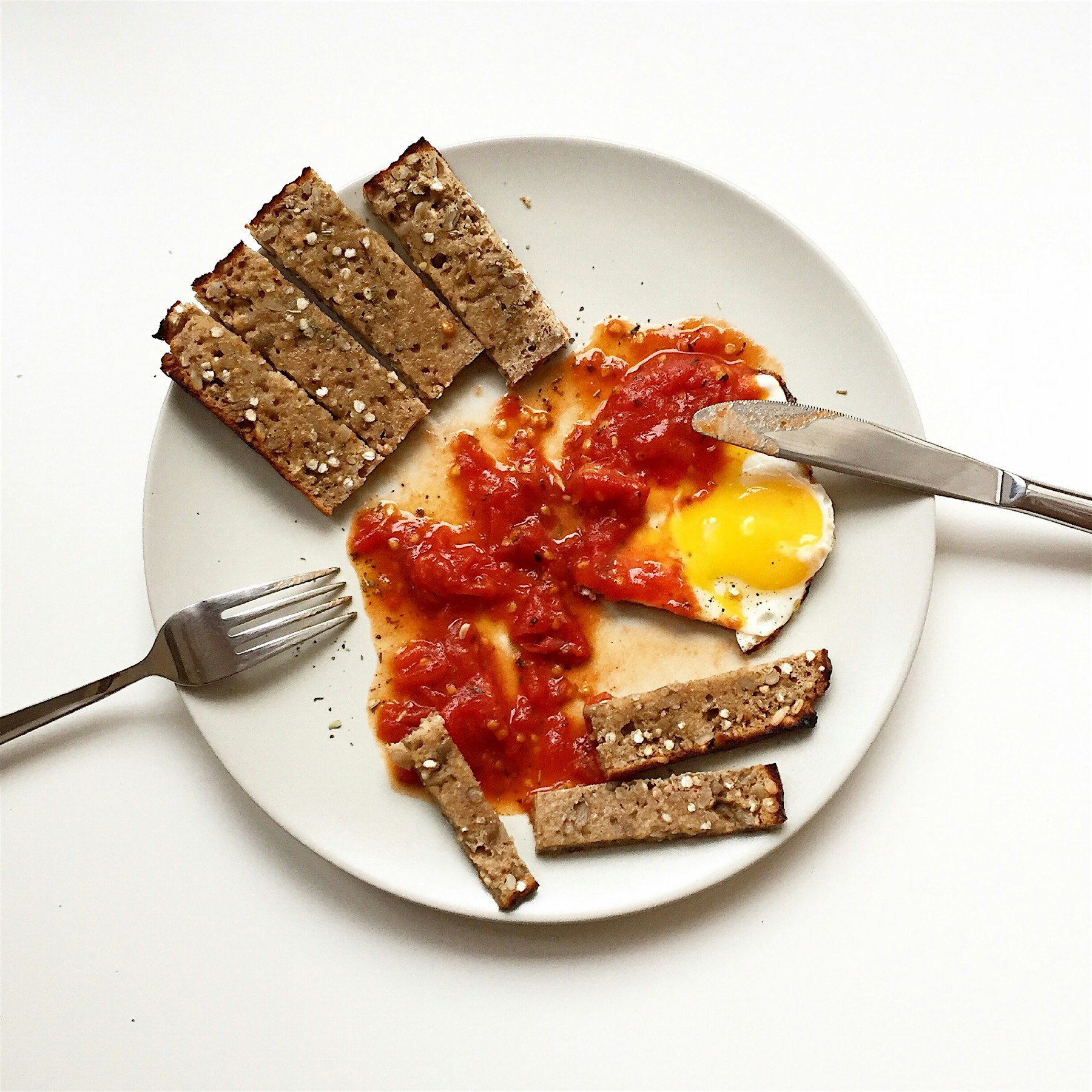 Got some overly ripped tomatoes on the kitchen counter so I made a sauce with them for my sunny s...