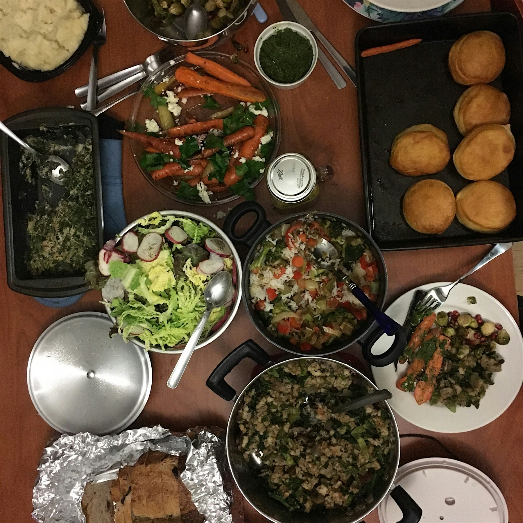 Our Friendsgiving spread was one for the books—roasted rainbow carrots with carrot top pesto and ...
