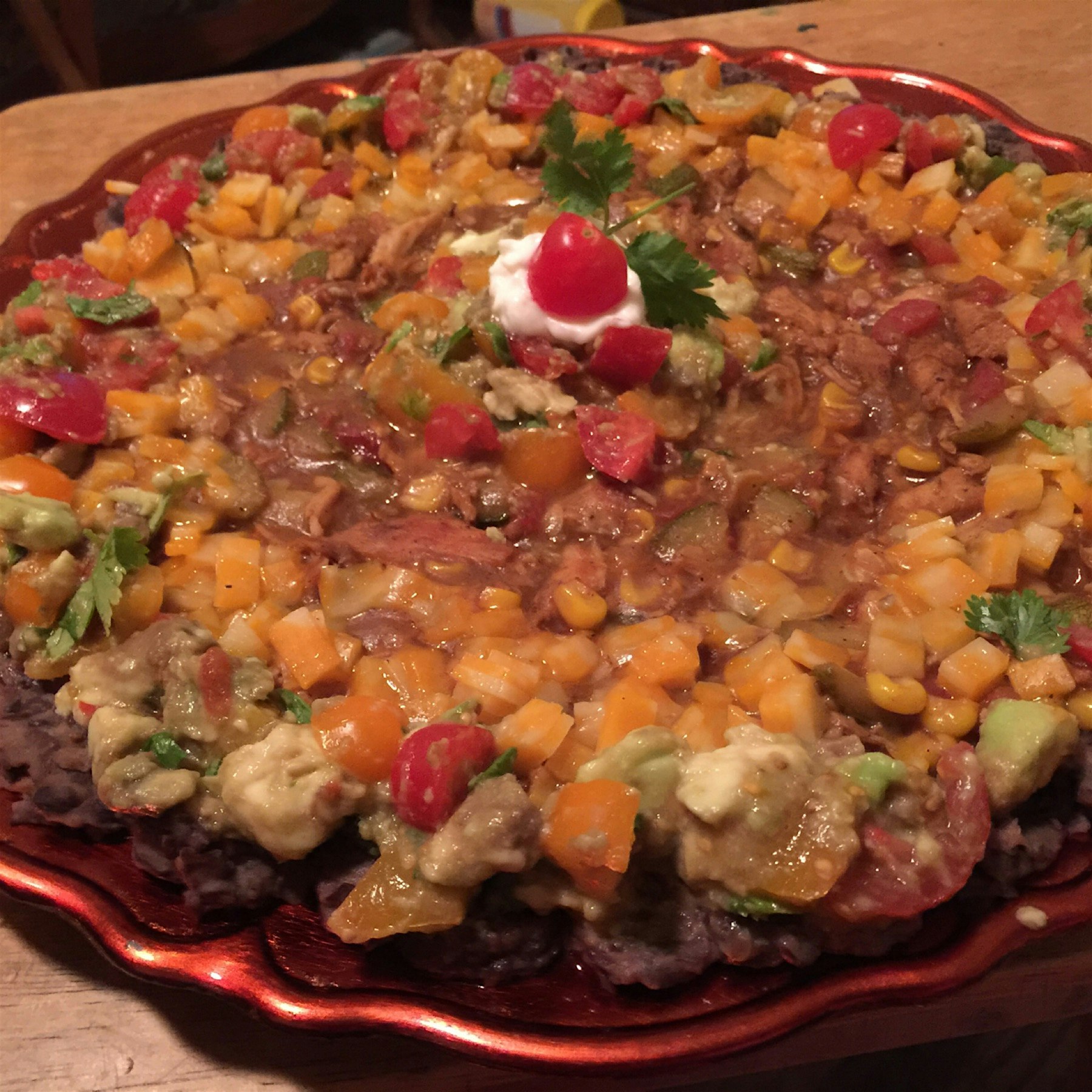 Chicken Calabazita dip. Refried black beans, cumin-scented chicken, calabazita, and corn. Topped ...