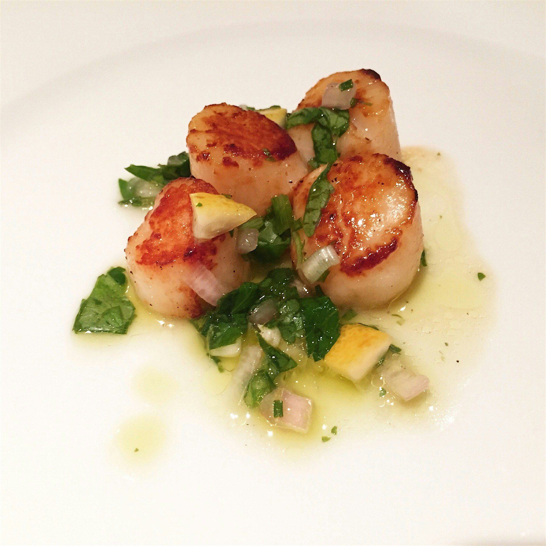 My man can sear a pretty mean scallop! Doesn't hurt when they're perfectly fresh off the fish tru...