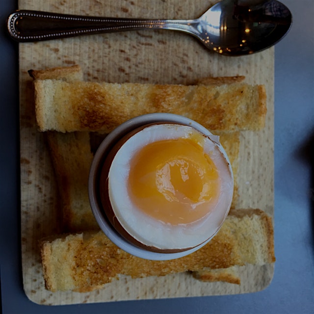 Soft-boiled egg and toast