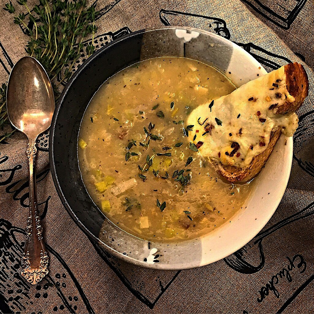 A warm bowl of Leek and Roasted Potato soup with a Gruyere 'crouton' for a gloomy Meatless Monday...