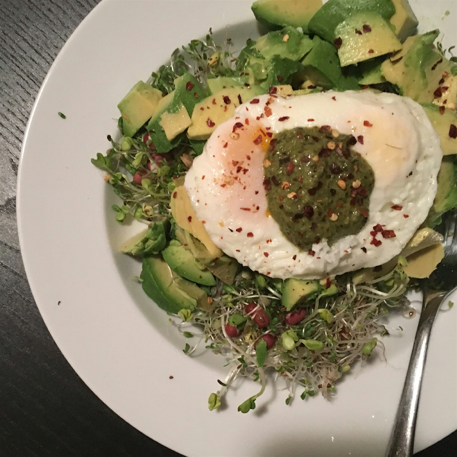 Speedy dinner - 5 minute prep! Bean Sprouts, Avocado, Pesto, topped with a poached Egg!