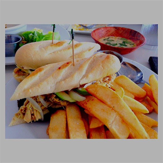 This Thai chicken sandwich w/ coconut curry dipping sauce was the bomb!! It's like a French dip g...