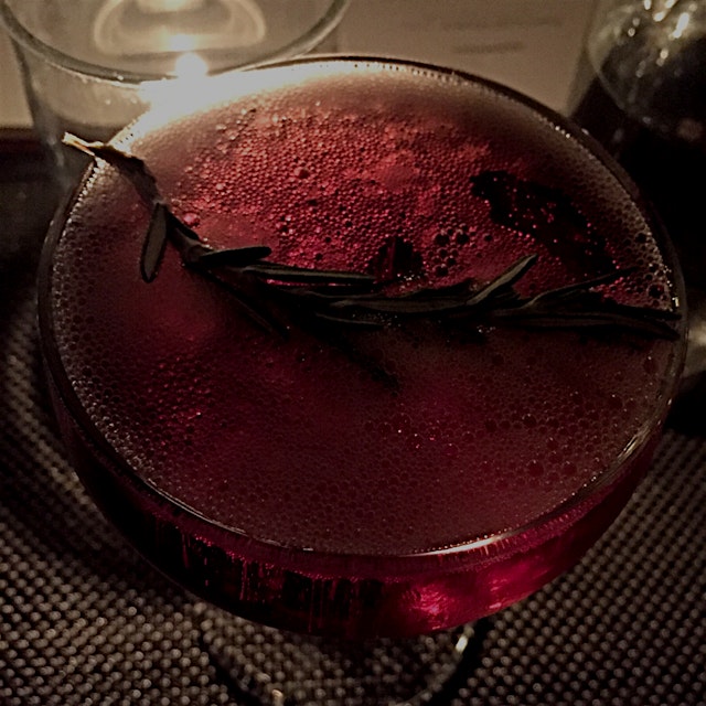 Cassis & desist: champagne with cassis and a sprig of rosemary.  Perfect holiday cocktail with @r...