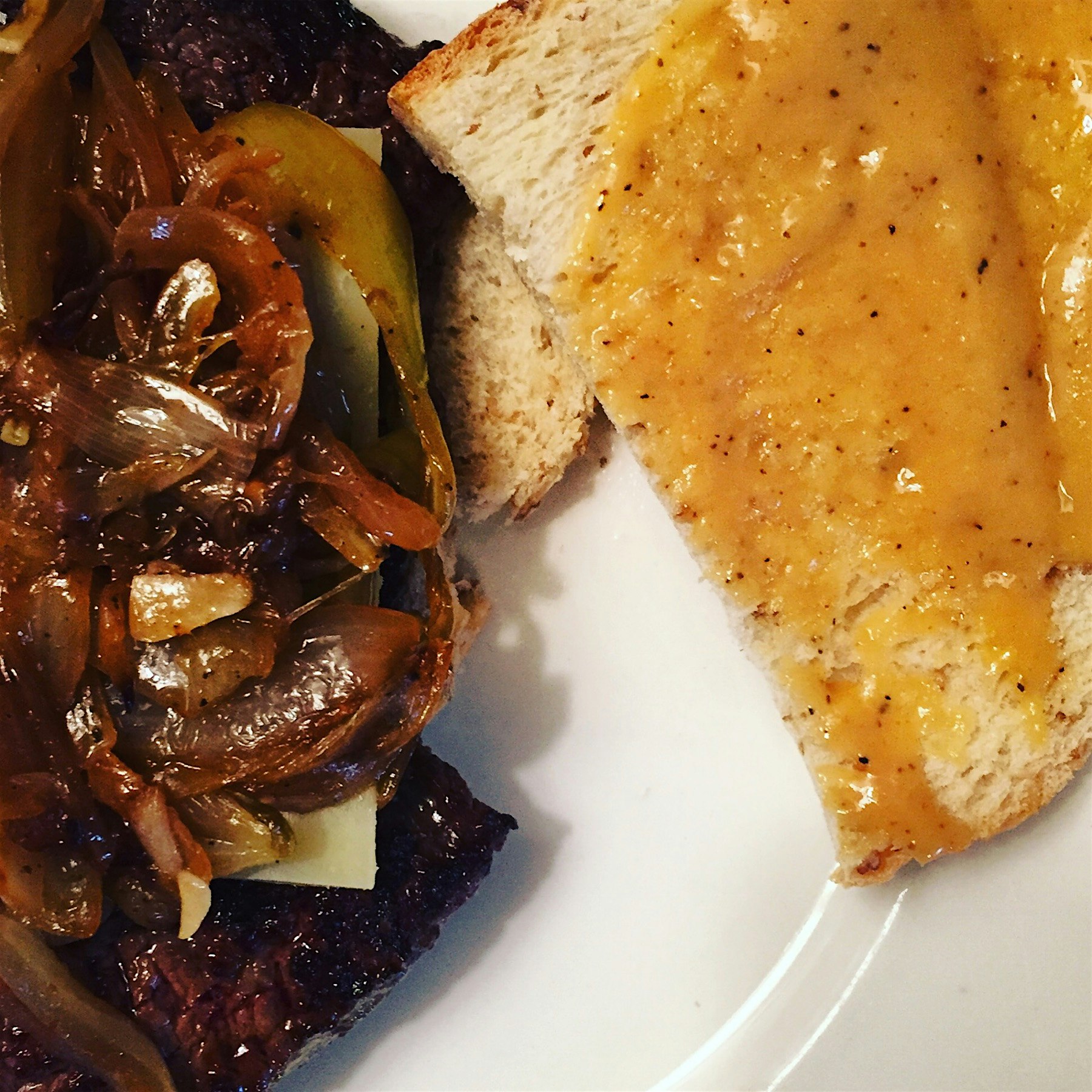 Venison steak sandwich with oscars mustard. 