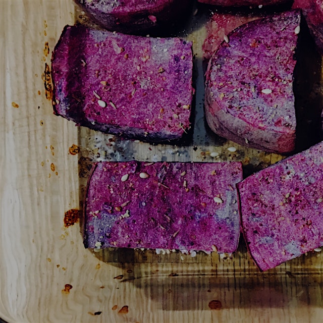 Beautiful purple sweet potatoes, baked with brown za'atar, sea salt, and lime juice. Not in the p...