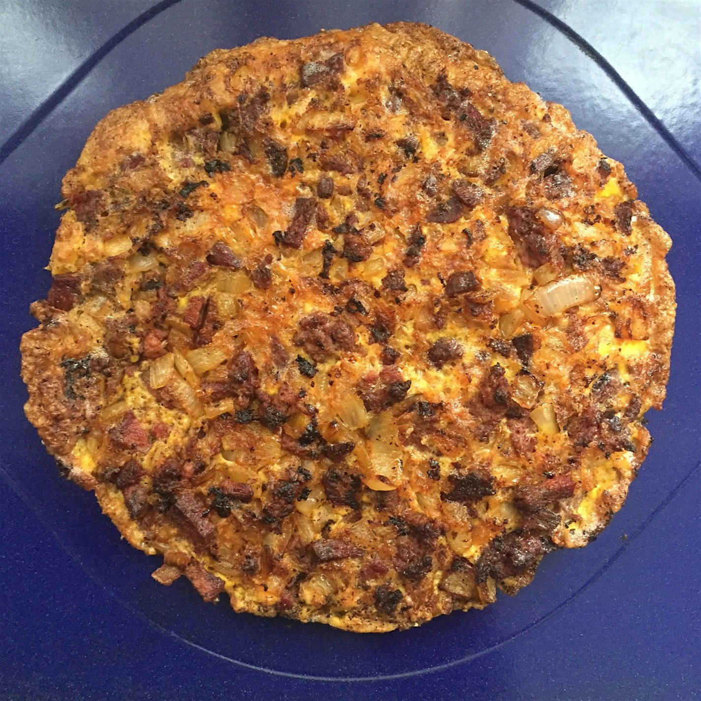 Egg pie with goose sausage and beef tongue. 