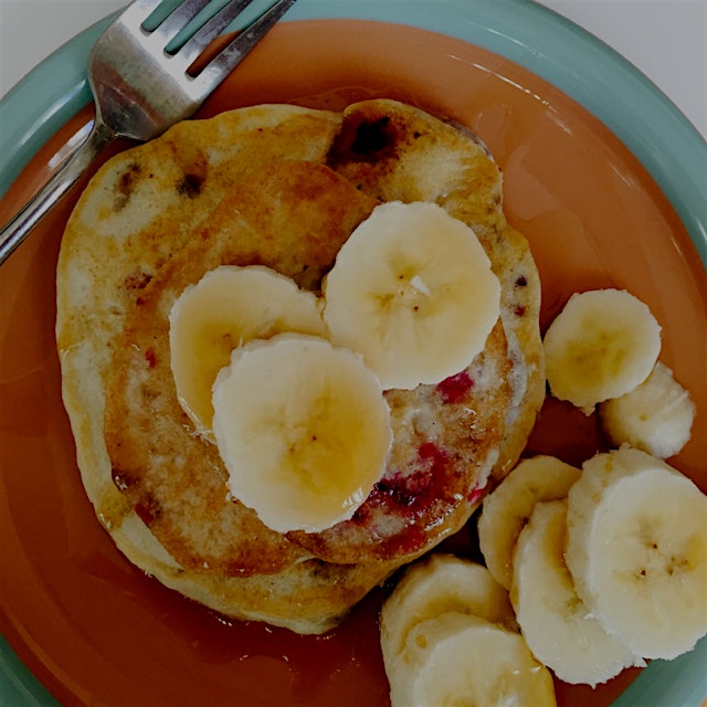Excellent way to begin the new year: gluten-free raspberry banana pancakes. With coffee, lots of ...