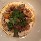 Roasted cauliflower and artichoke over Greek yogurt (no hummus for me) with radishes and tomatoes 