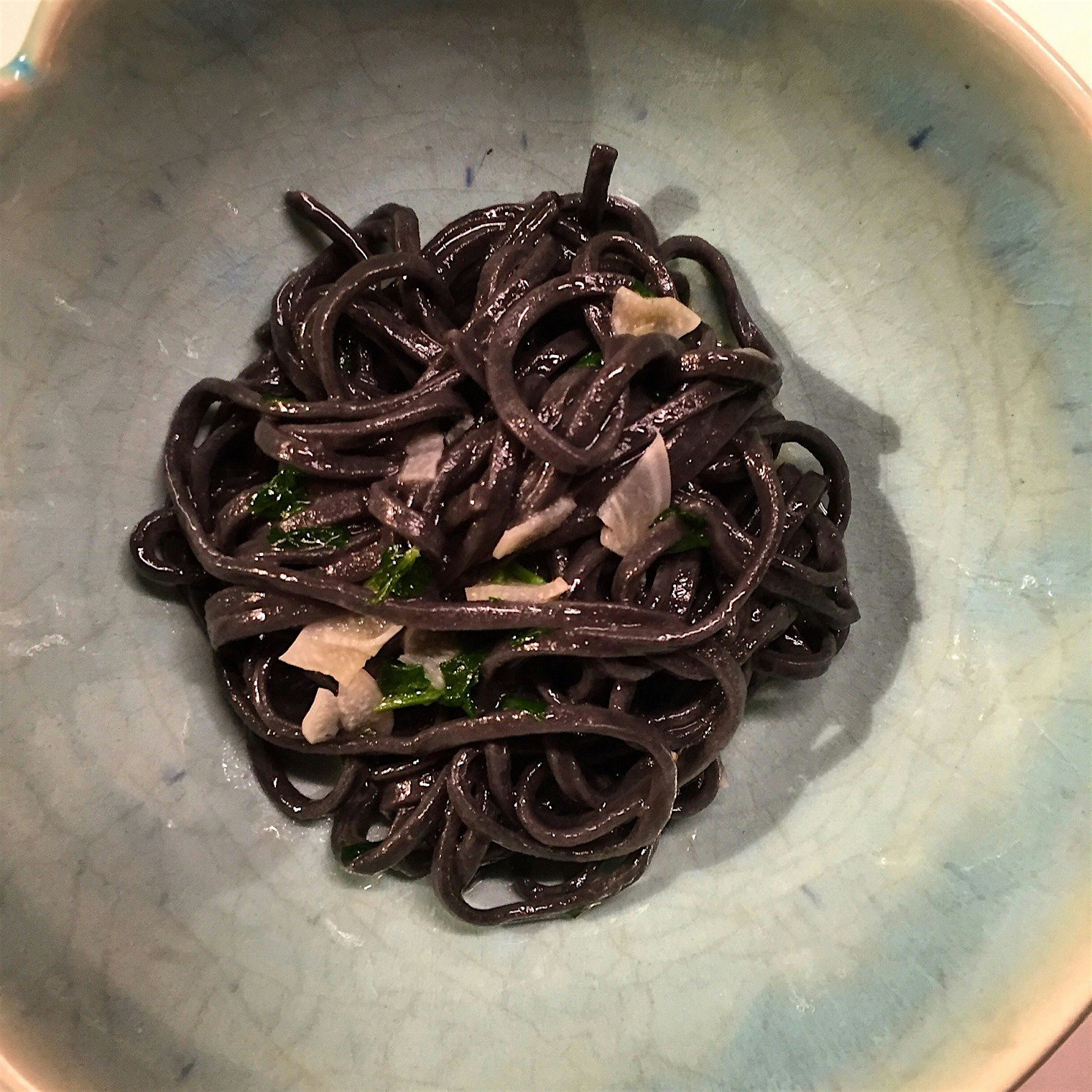 Simple squid ink pasta my parents brought over to enjoy together. 