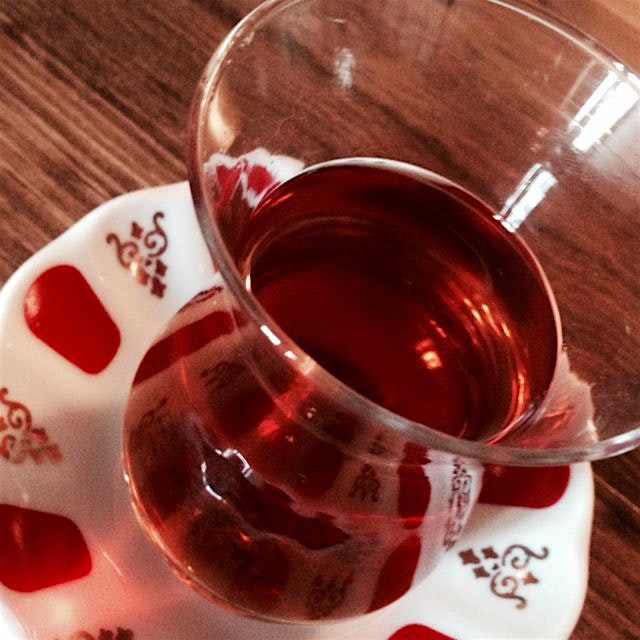 Enjoying a Turkish tea at home, complete with cups and saucers purchased in Fatih, Istanbul.