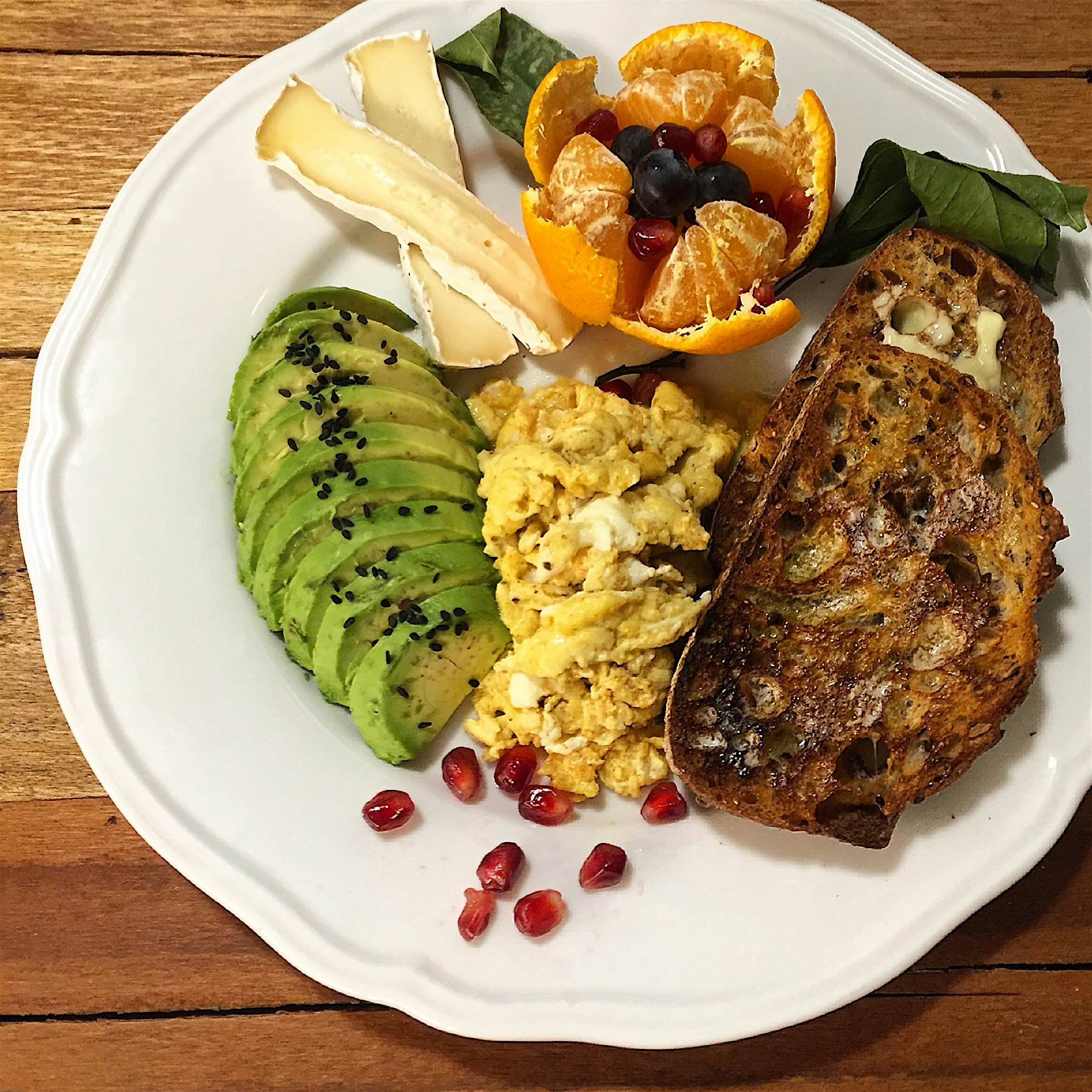 Breakfast this morning: turmeric scrambled egg (egg wash from my pie the other day!) seeded sourd...