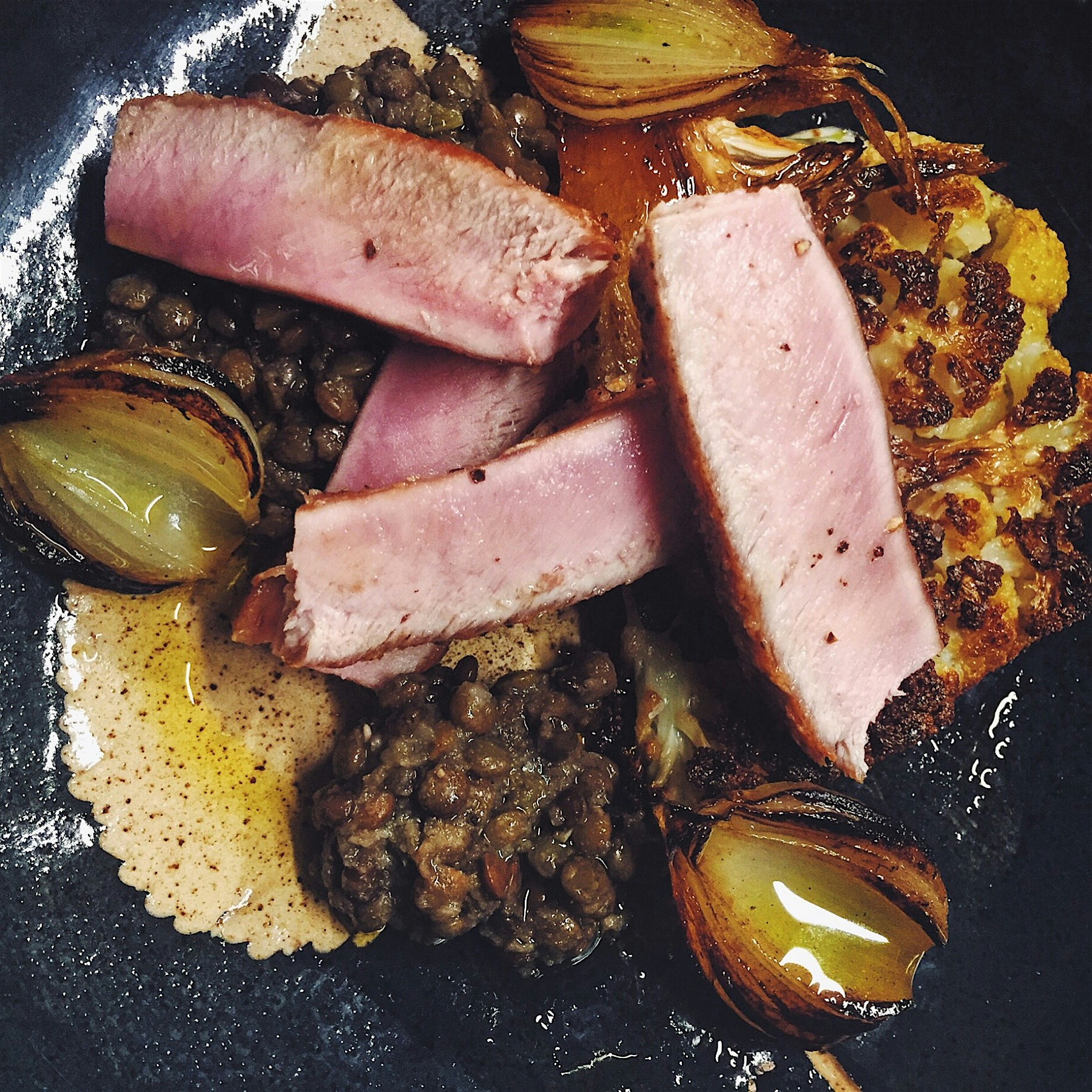 Wild rabbit, braised lentils, roasted cauliflower. 