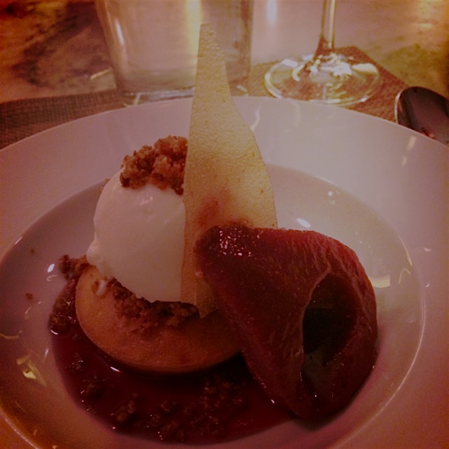 Sangria poached Pear with Almonds biscuit, Almonds nougatine, toasted Almonds gelato 