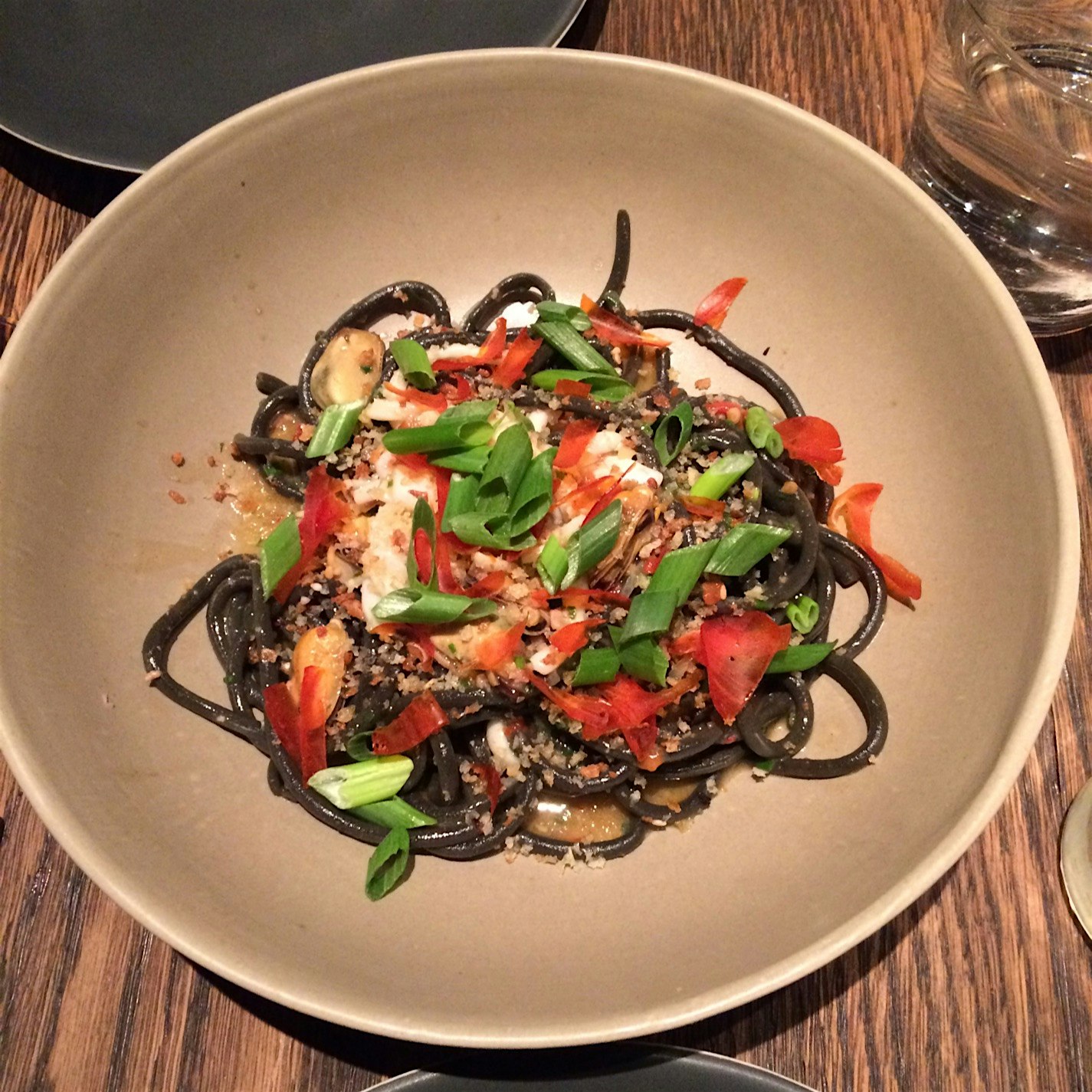 A fresh taste of the sea from this Philadelphia import. House made Seaweed bucatini with spicy Po...