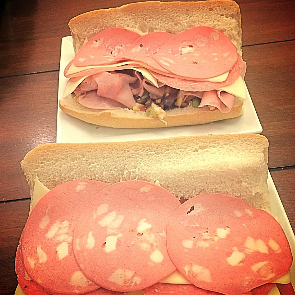 Muffuletta with natural LOSADA cornicabra and gordal olives, OMED arbequina EVOO and rose' vinega...