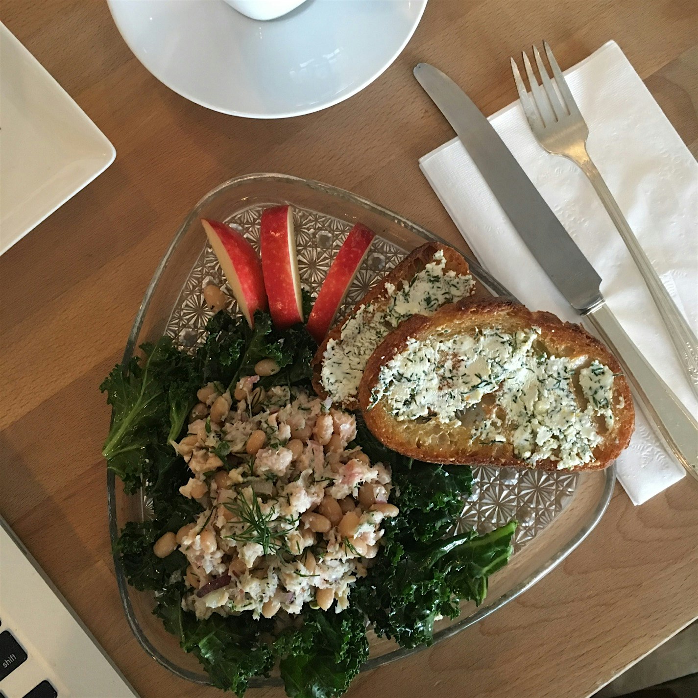 Local trout and white bean salad on a bed of kale. The wifi is great, tables are big, and the spi...