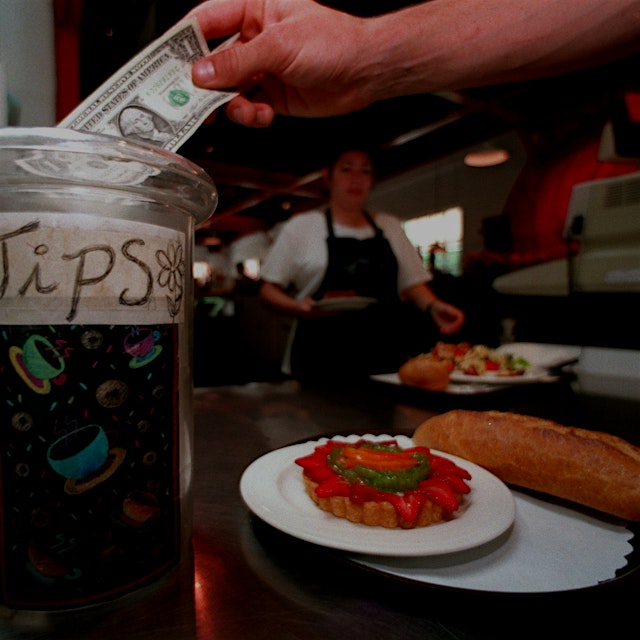 What do you think- is tipping an outdated model?  "A court ruling is pushing California restauran...
