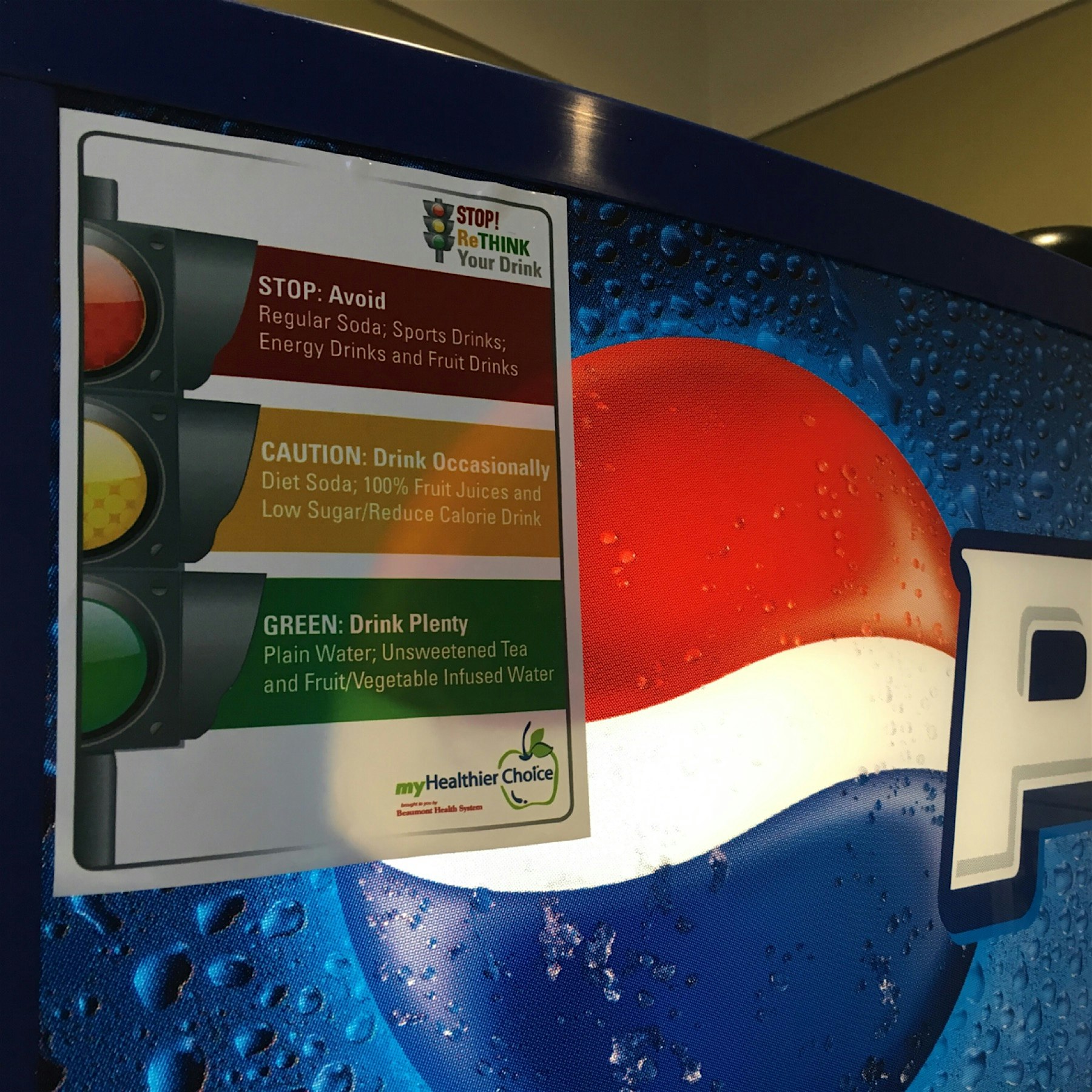 The sign says to avoid soda, drink diet soda and fruit juices occasionally, and drink plenty of w...