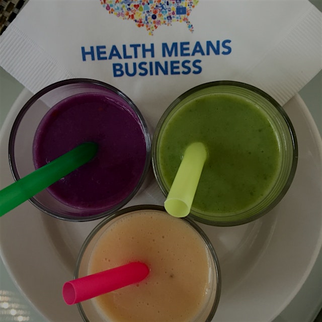 Smoothies and other fresh healthy food being served at the Cleveland Health Means Business Forum ...
