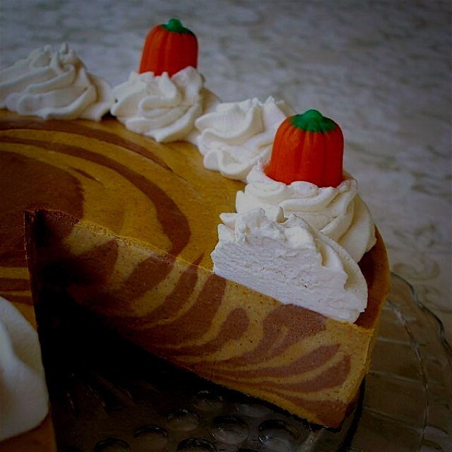 New recipe! Pumpkin and Chocolate Striped Cheesecake Tutorial on my website www.CraftyBaking.com ...