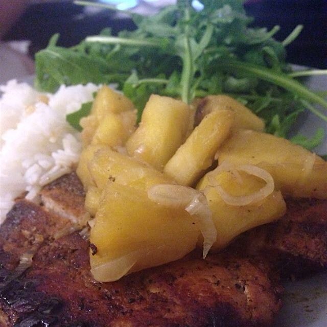 Grilled pork loin with pineapple salsa, arugula, and white rice