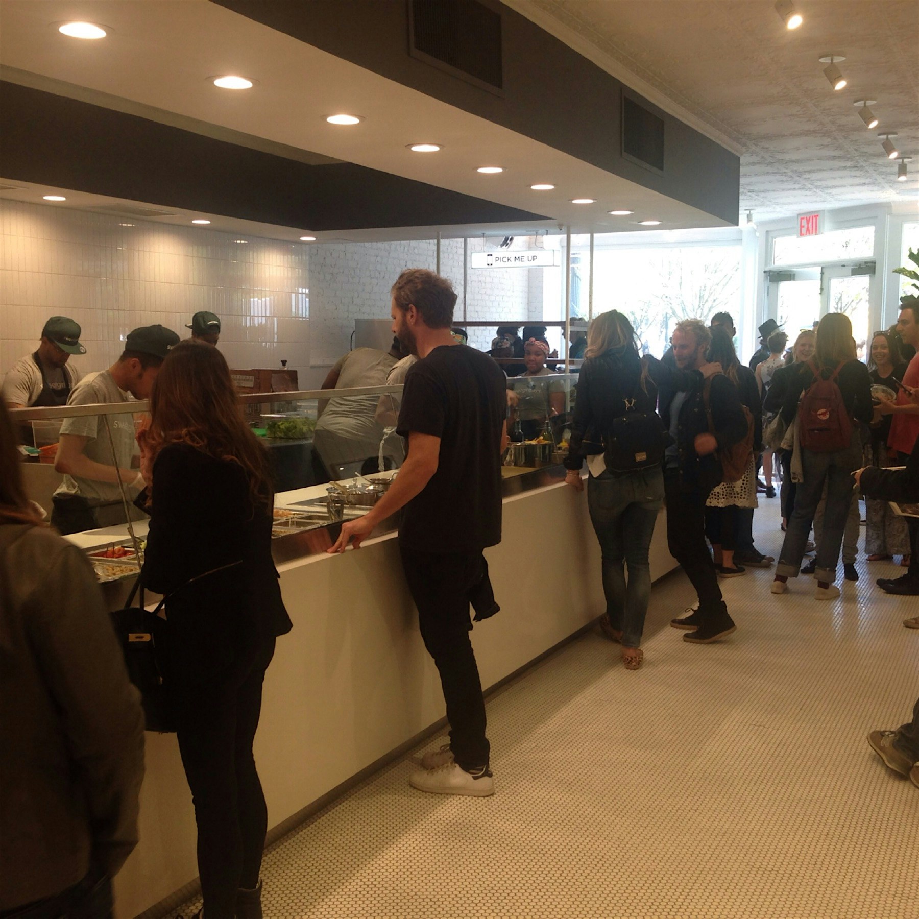 The folks at MediClub got together to enjoy the opening. All proceeds go to @grownyc farm boxes.