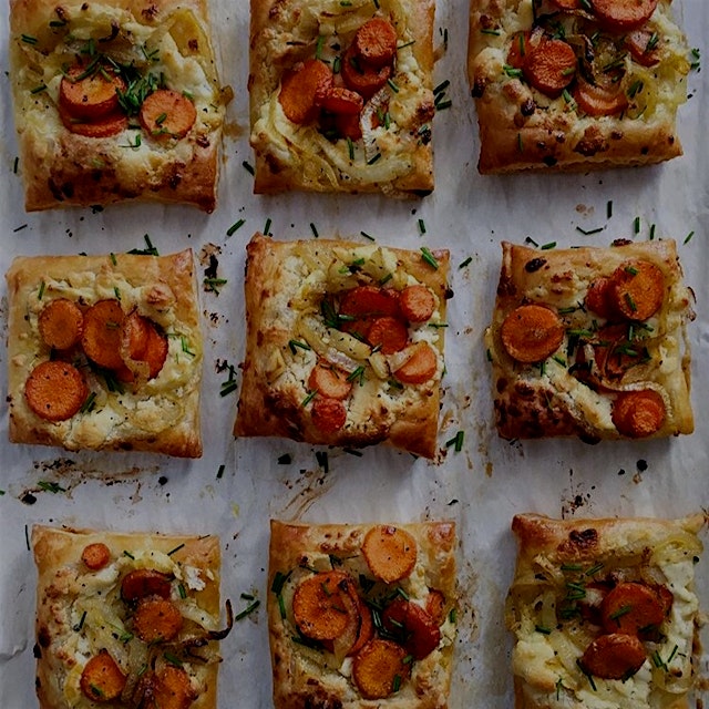 Puff pastry, smear of goat cheese, carrots sautéed with shallots, and thyme. Topped with chives! ...