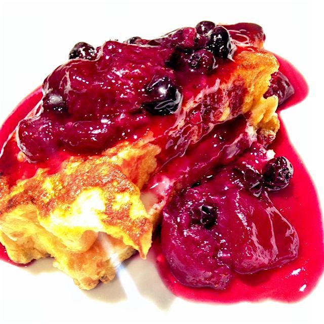 Brioche French toast. Lemon curd stuffed. Bourbon berries with orange blossom water. 