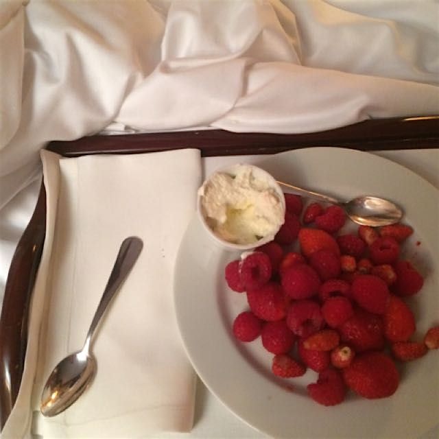 Berries, cream and crisp sheets on birthday eve in Paris. Literally nothing better ...