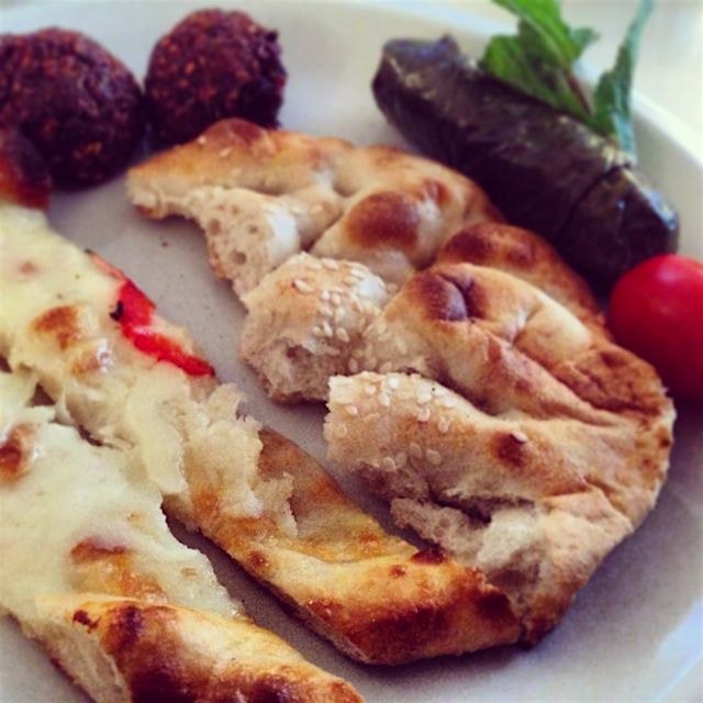 Pide bread with grape leaves and falafel from A La Turka on the UES. Hummus off screen! 