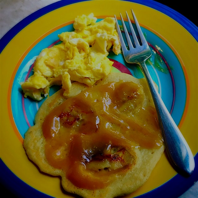 My little Japanese guest's favorite breakfast - banana pancakes slathered in Kaya and scrambled e...