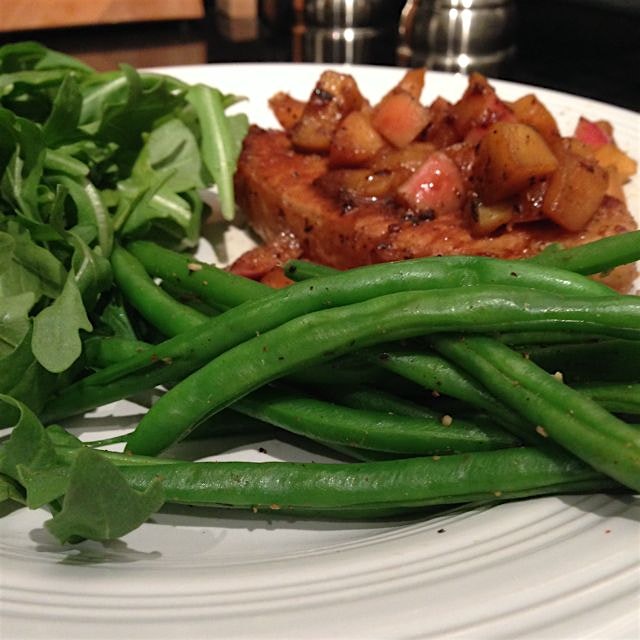 Dinner with fresh greens and apple sautéed pork chops! #yum