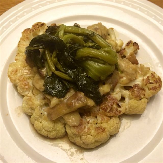 Cauliflower steak from the other night. Vegan creamy mushroom sauce and broccoli rabe. I hope the...