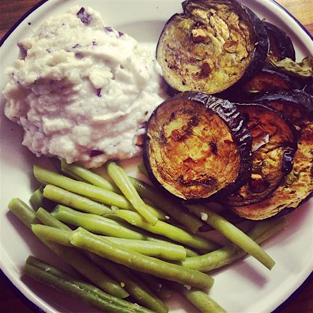 Eggplant roasted with garlic, served with cauliflower and red onion purée and green beans