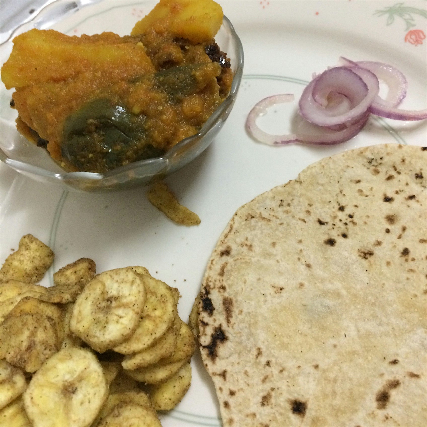 Amritsari wadi ,roasted eggplant & potatoes with roti. Conscious effort to eat one bite at a time...