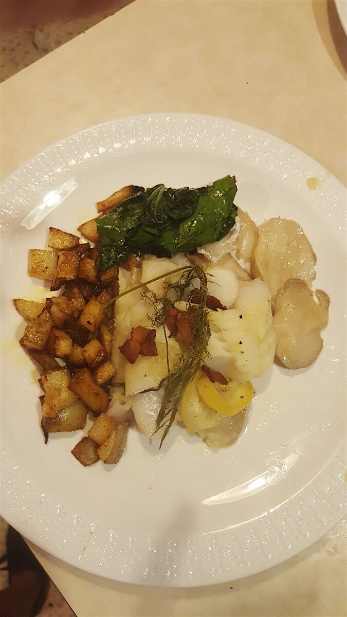 Alaskan Whitefish poached in a bit of butter with king mushroom, onion, fennel frond. Sauteed lam...