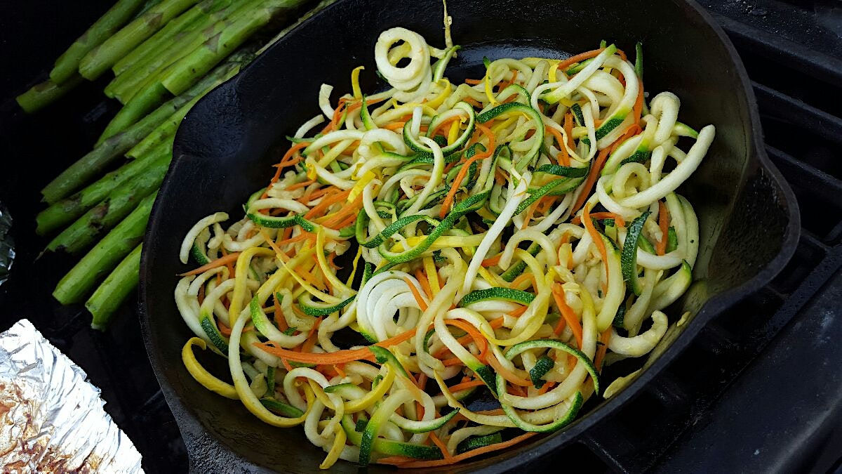 Cast iron, charcoal grill, spiralized veggies....how you make an 8 year old eat his veggies! 