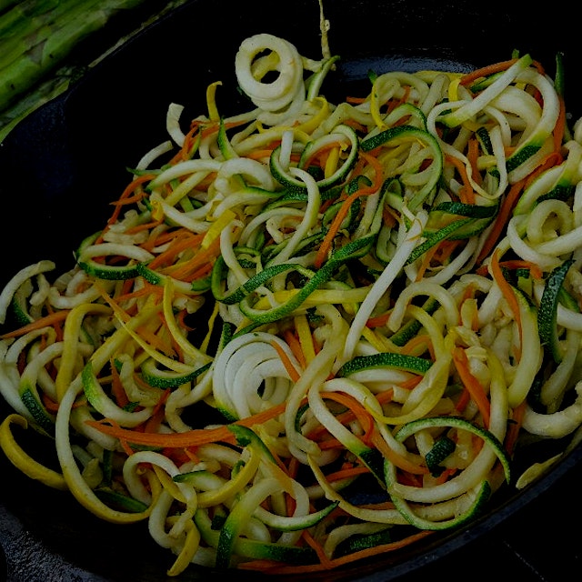Cast iron, charcoal grill, spiralized veggies....how you make an 8 year old eat his veggies! 
