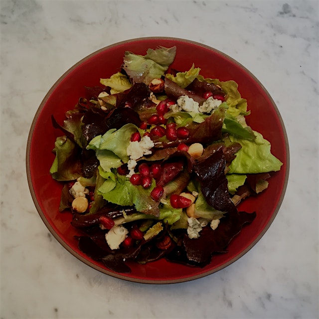 Pomegranate seeds, toasted hazelnuts and Roquefort (blue) cheese with butter lettuce are deliciou...