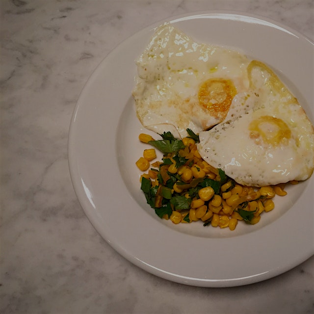 Eggs pair with almost anything! I had some leftover corn salsa with cilantro, scallions, mint and...