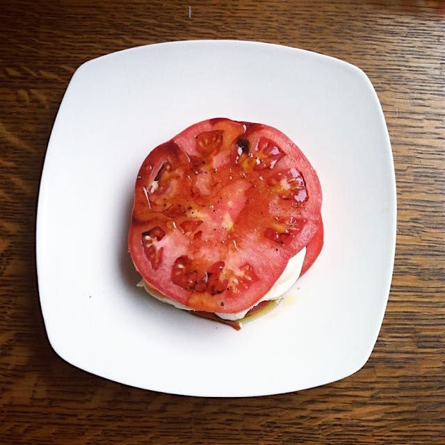 Summer salad throwback: Fresh caprese salad with massive local tomatoes.